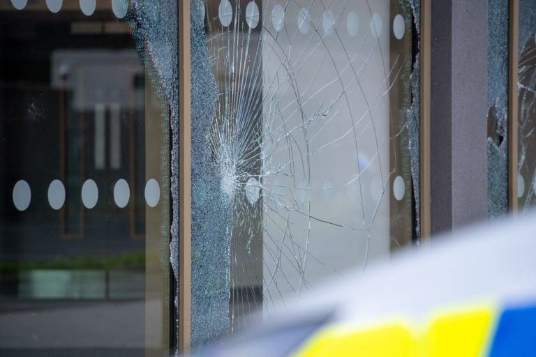 Smashed window at crime scene